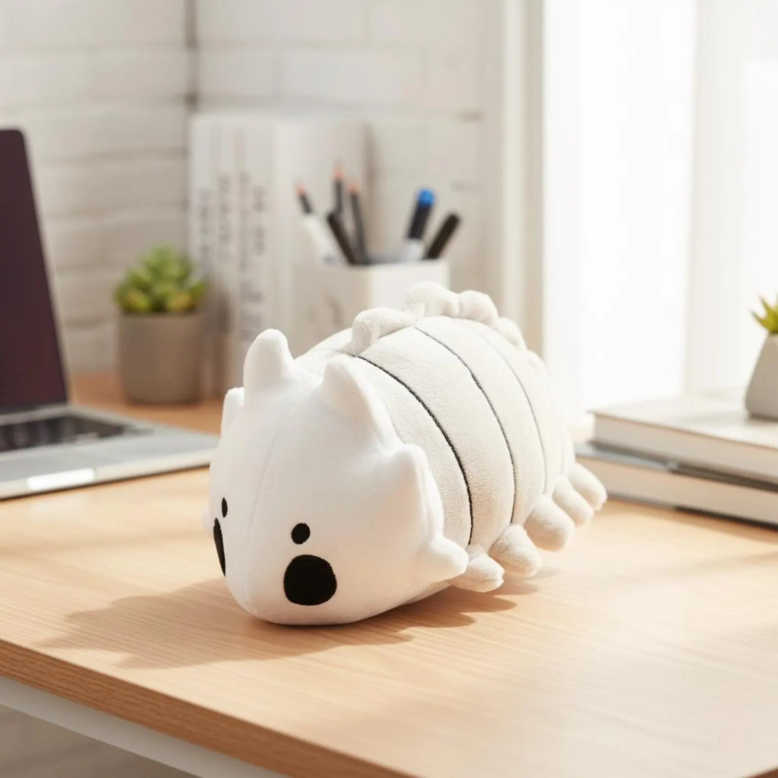 The Bell Beast Plush Toy sitting on a collector's shelf or gaming chair, ready for display.