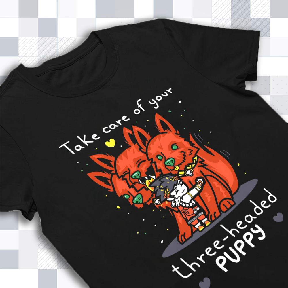 A detailed close-up of the quote 'Take Care of Your Three-Headed Puppy' on the Hades merch shirt