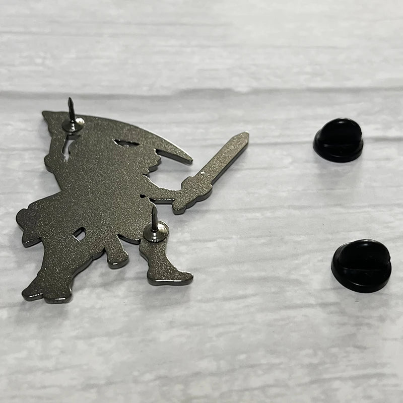 Back view of the Hades pin, showing the secure backing clutch