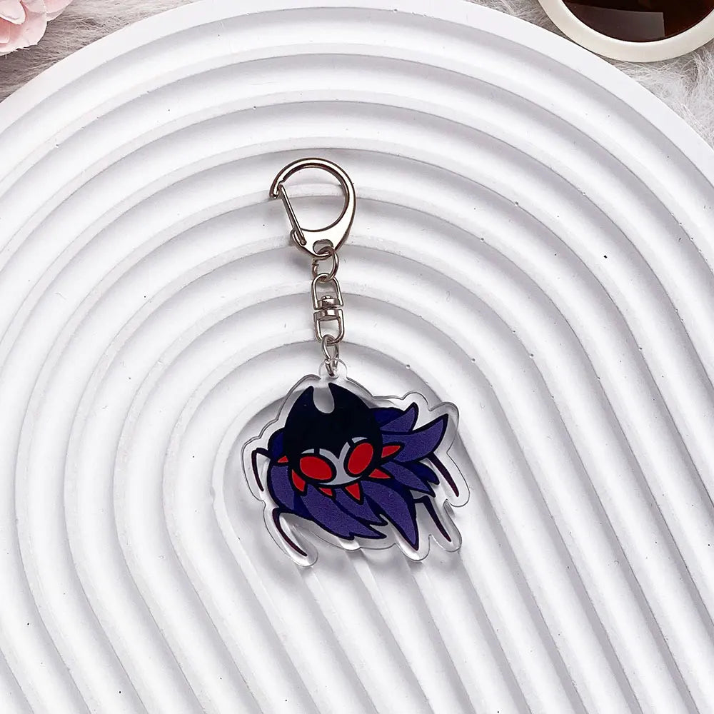 Close-up of The Knight acrylic keychain, showing print detail, model10