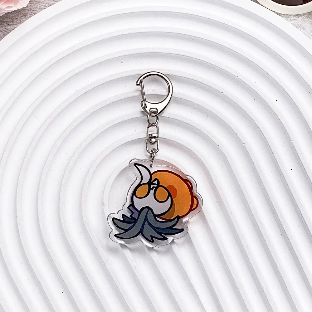 Close-up of The Knight acrylic keychain, showing print detail, model9