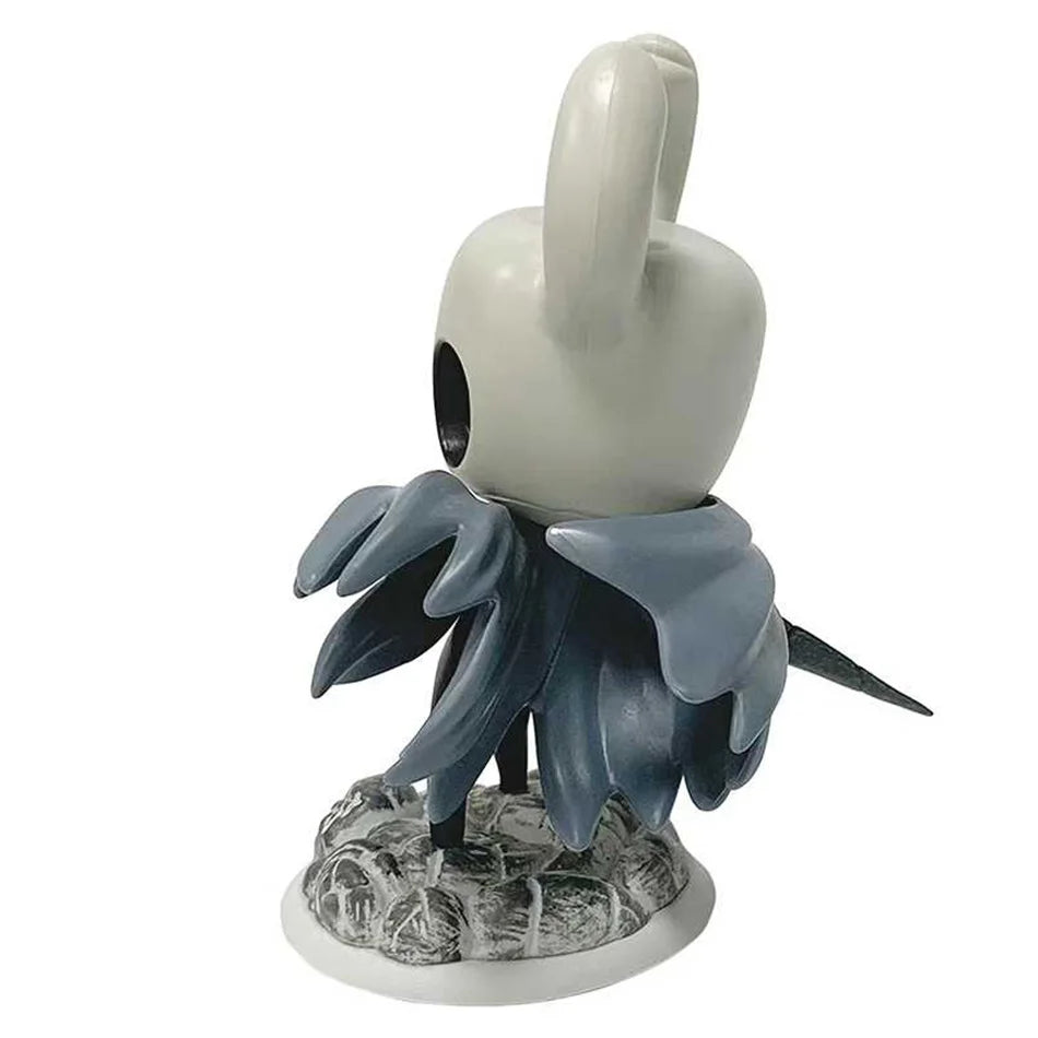 Side view of Hollow Knight Knight figure, showing posture and nail