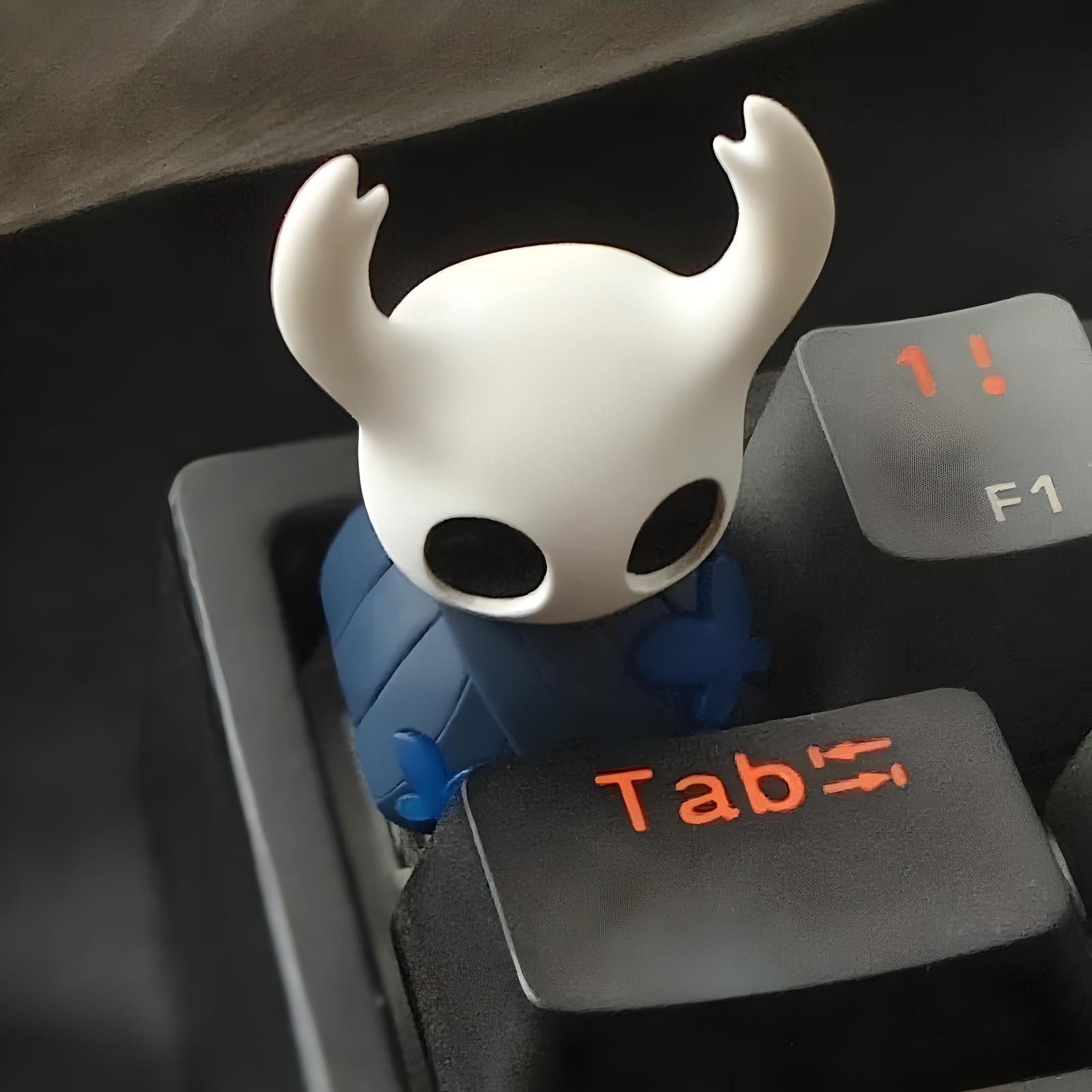 The Knight Hollow Knight Keycap displayed on a mechanical keyboard, showing its placement on the ESC key
