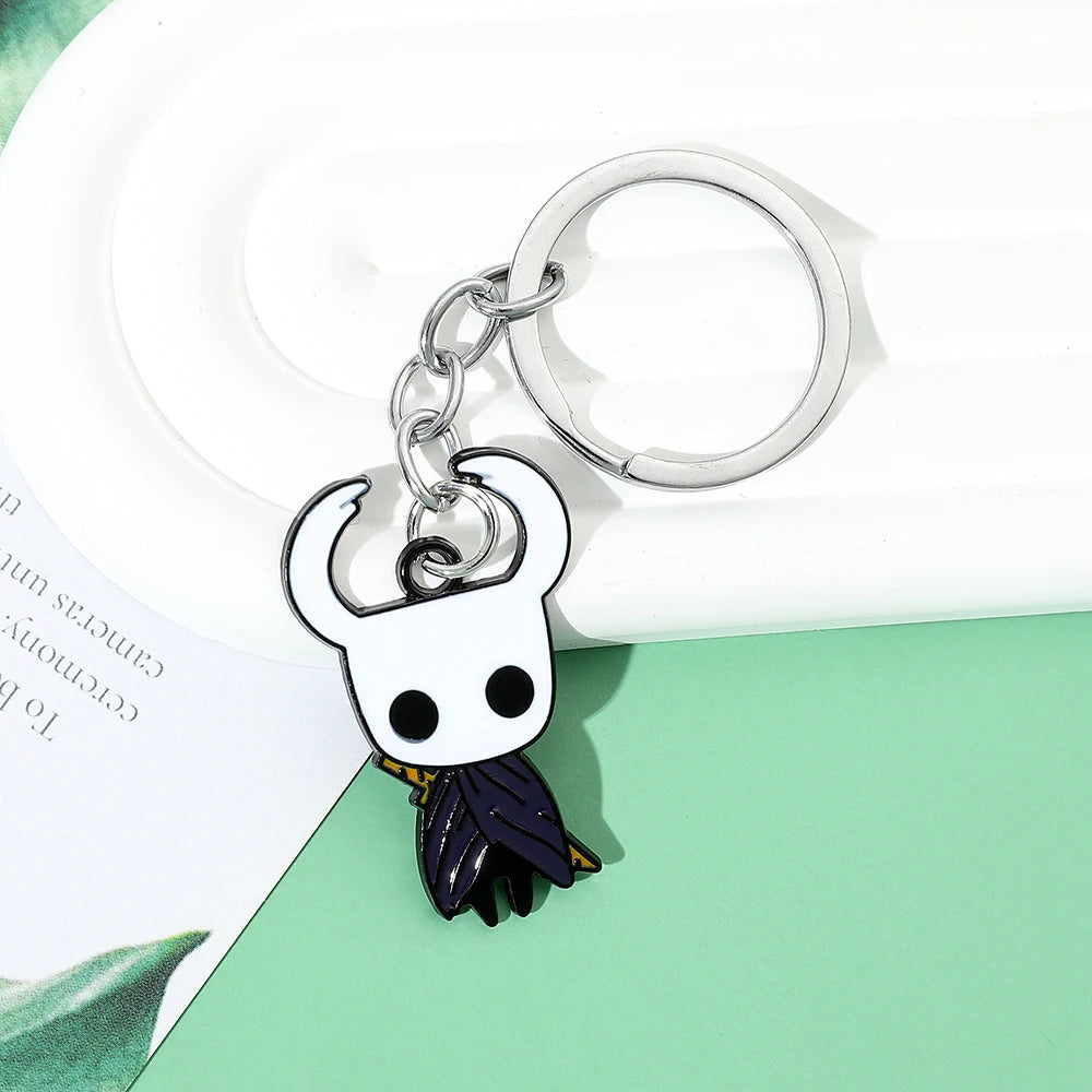 Front view of the cute Hollow Knight metal keychain model 1.