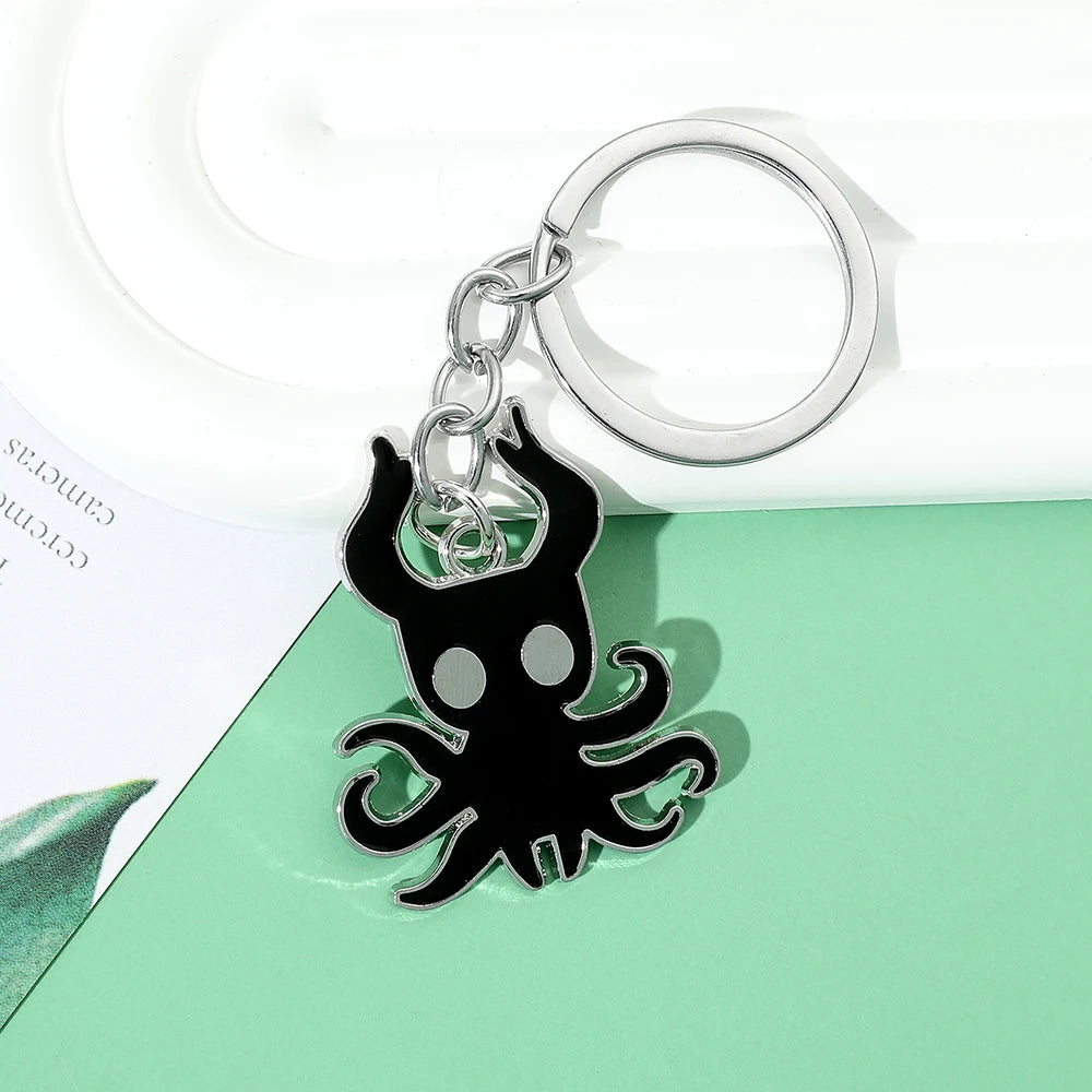 Front view of the cute Hollow Knight metal keychain model3