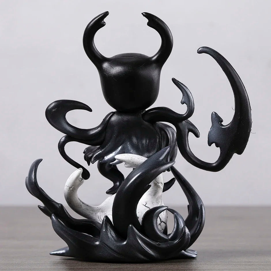 Back view of Hollow Knight Shade figure, showing void design