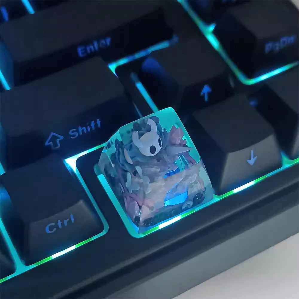 The Hollow Knight Transparent Keycap on a mechanical keyboard with the backlight turned on, showcasing the translucent effect