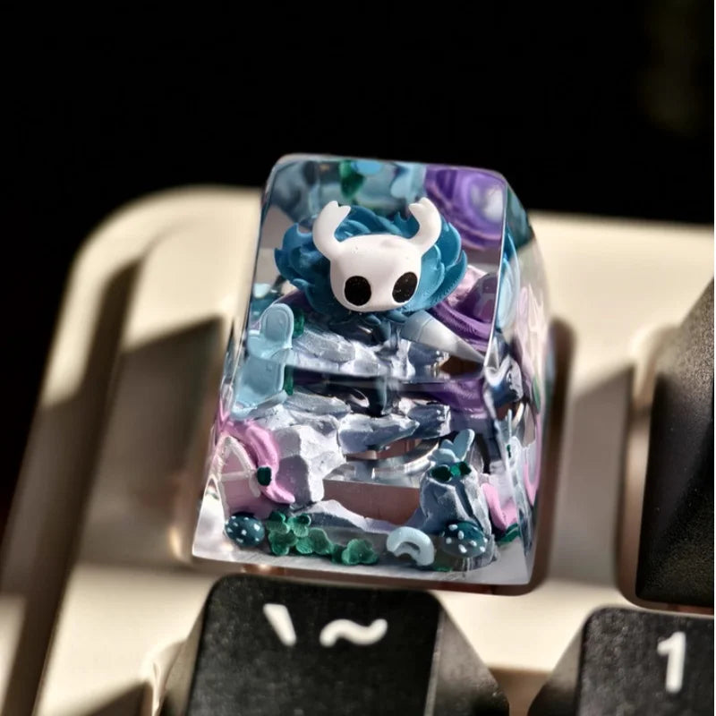 Close-up detail of the Hollow Knight Transparent Keycap, highlighting the resin and hand-painted artistry.