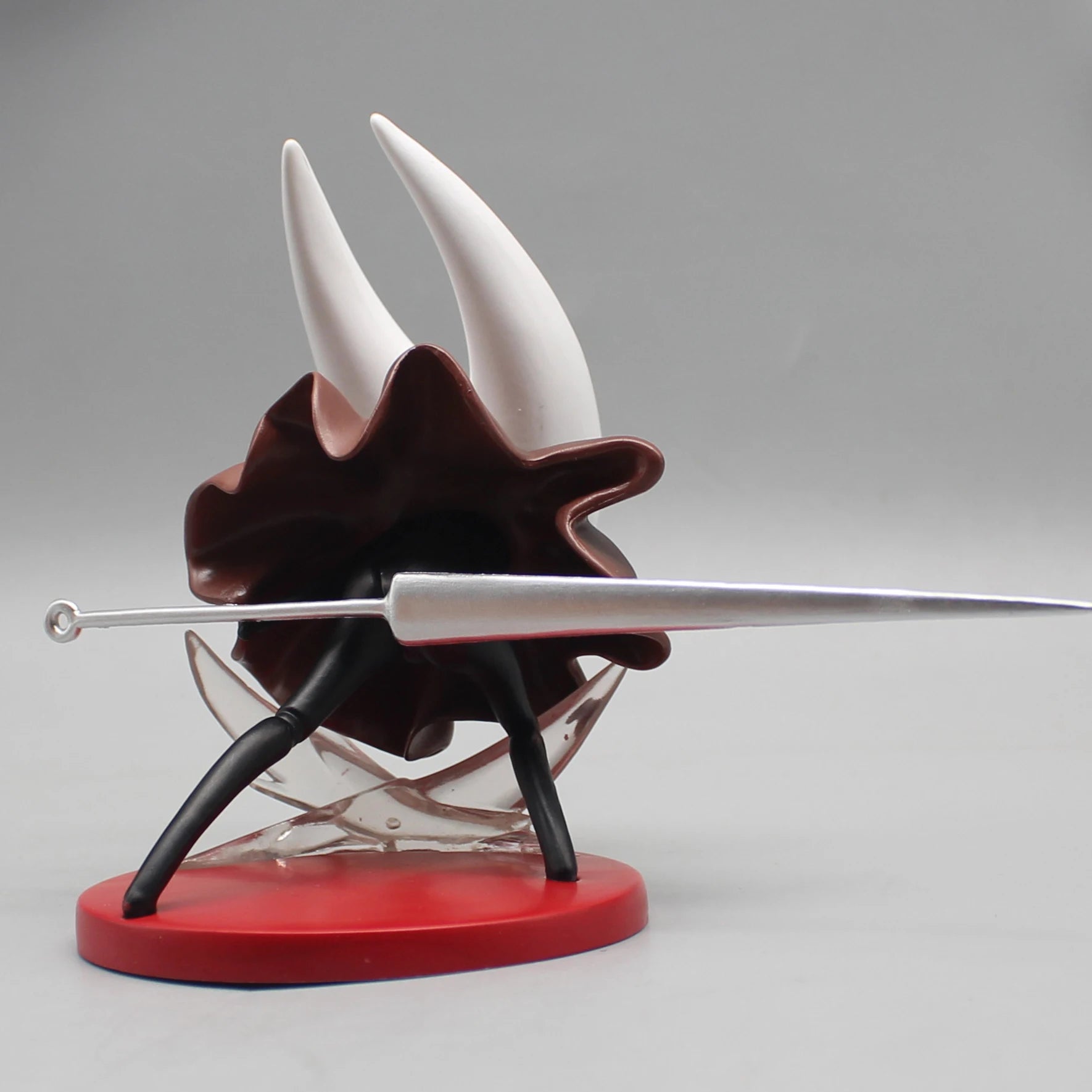 Close-up of the detailed sculpt of Hornet's iconic needle on the Silksong collectible figure