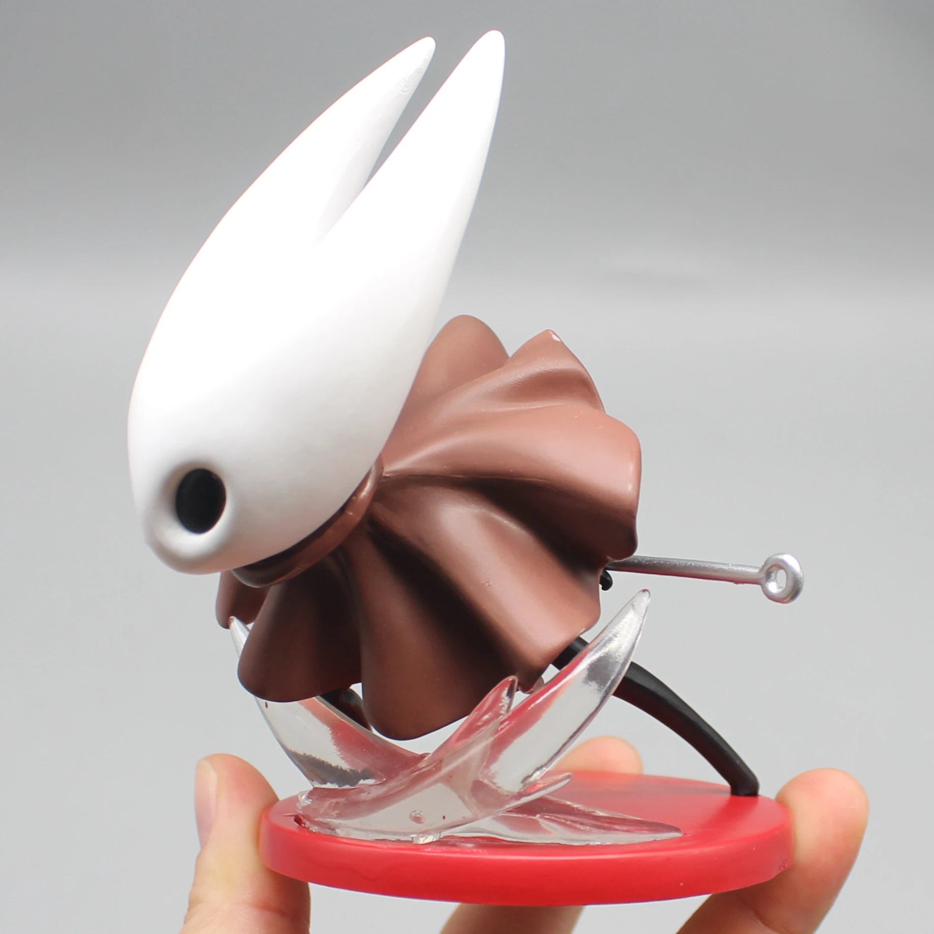 Close-up of the detailed sculpt of Hornet's iconic needle on the Silksong collectible figure