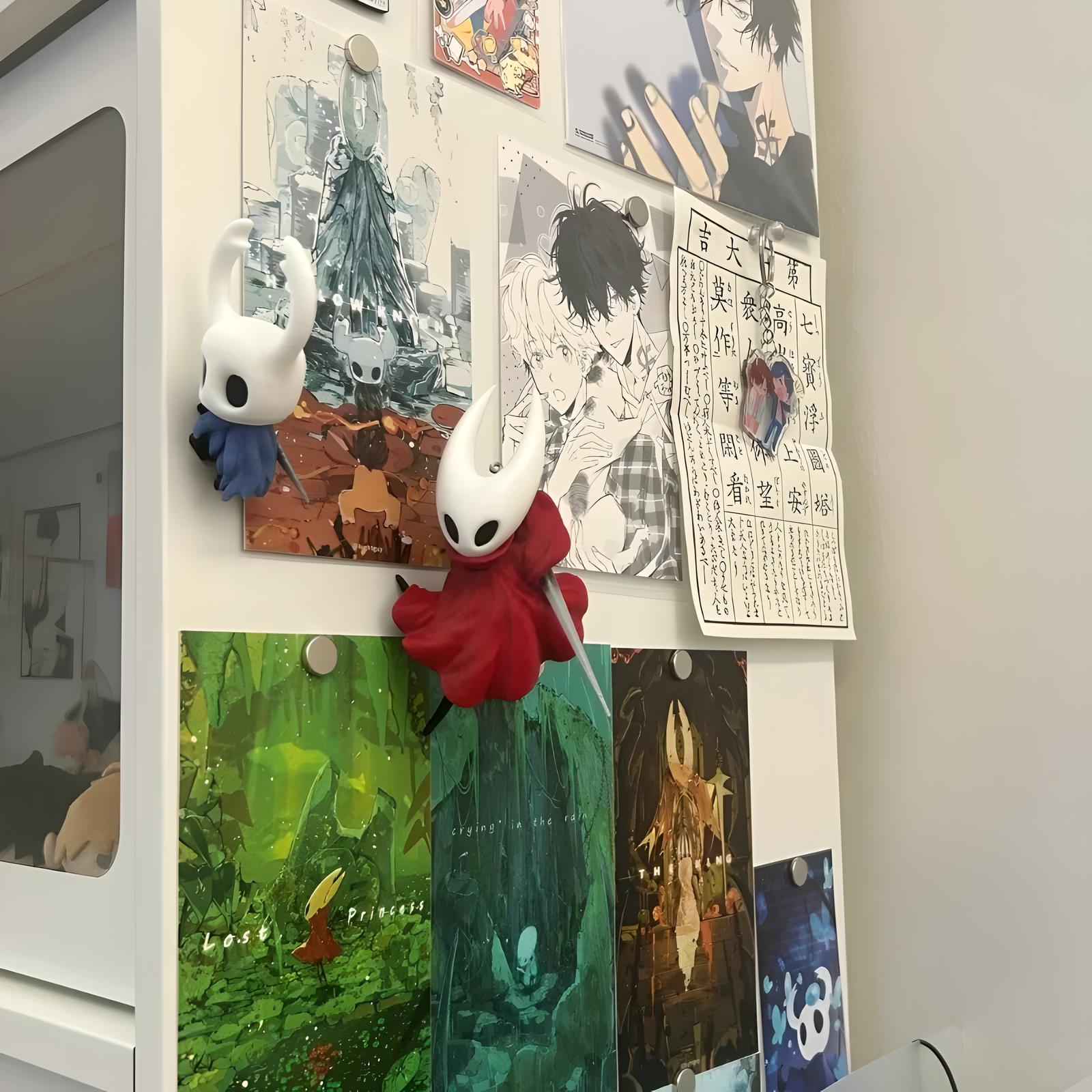 The Knight and Hornet Refrigerator Magnet displayed on a fridge door holding a note, showing its practical use and size