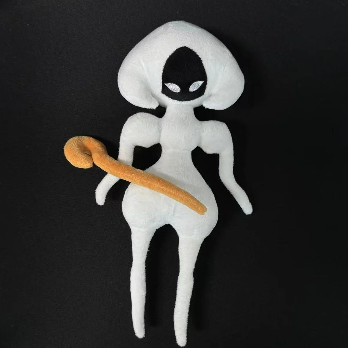 The Lace Plush Toy in a side view, emphasizing the fullness and shape of the Queen of Silk design.