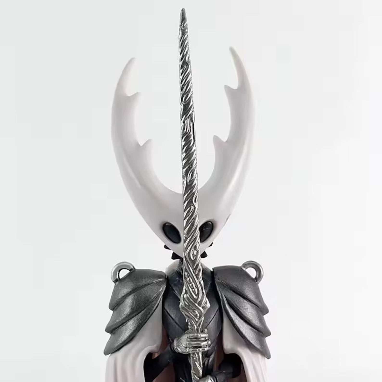 Close-up of the detailed sculpt of The Pale King's horns and cloak, showing the quality of the figure