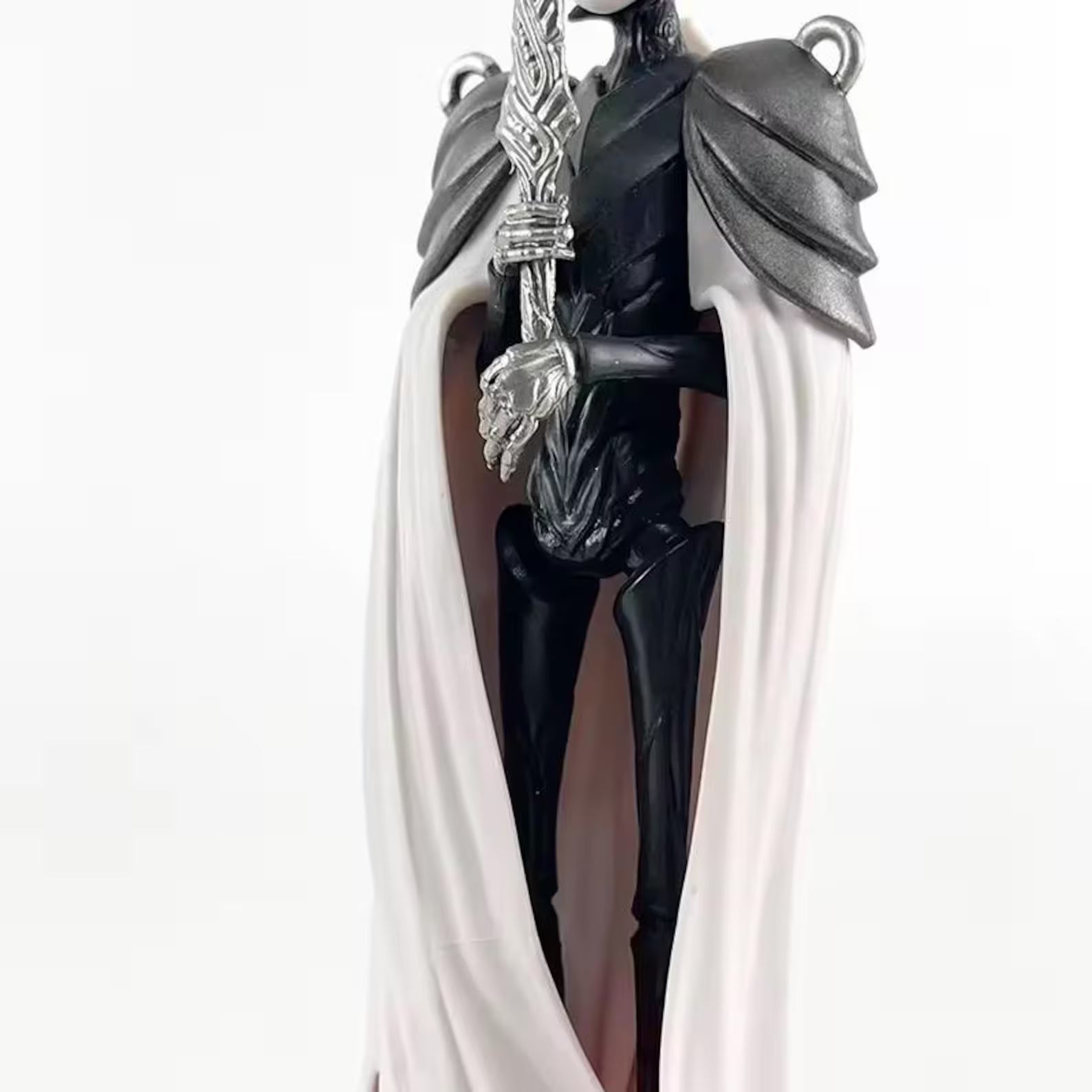Close-up of the detailed sculpt of The Pale King's horns and cloak, showing the quality of the figure."