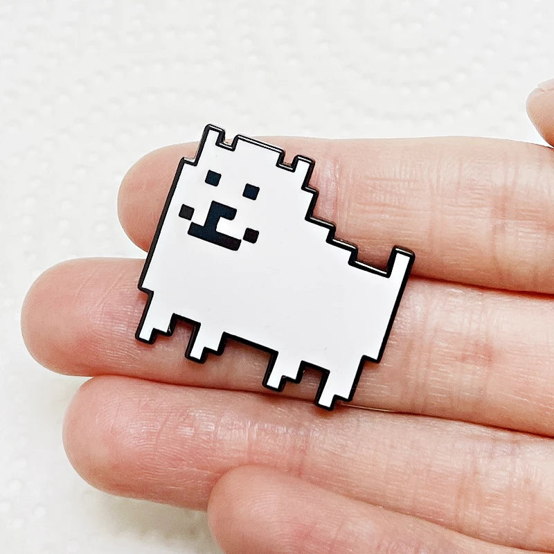 Close-up of one of the Annoying Dog Enamel Pins, highlighting the funny character design and hard enamel finish.