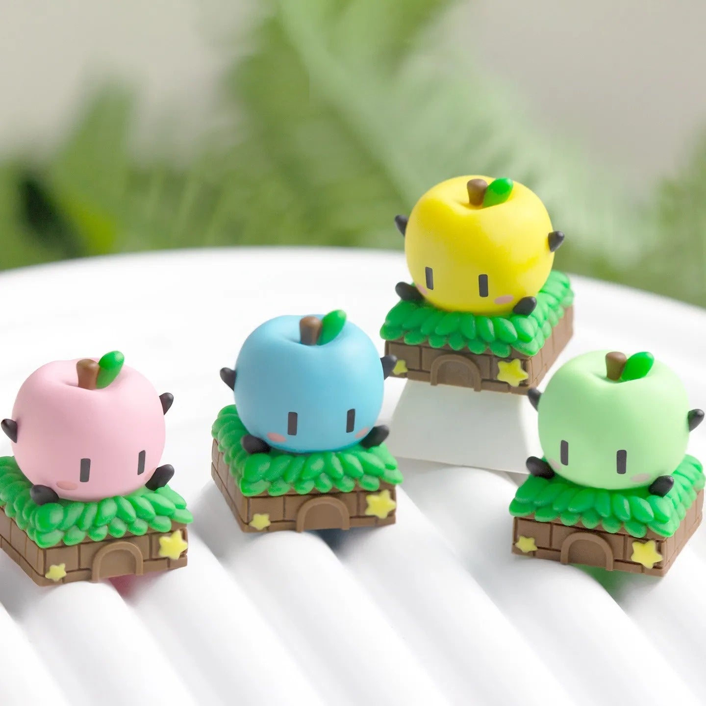 Side profile of the Junimo Stardew Valley Keycap highlighting the smooth finish and hand-crafted detail.