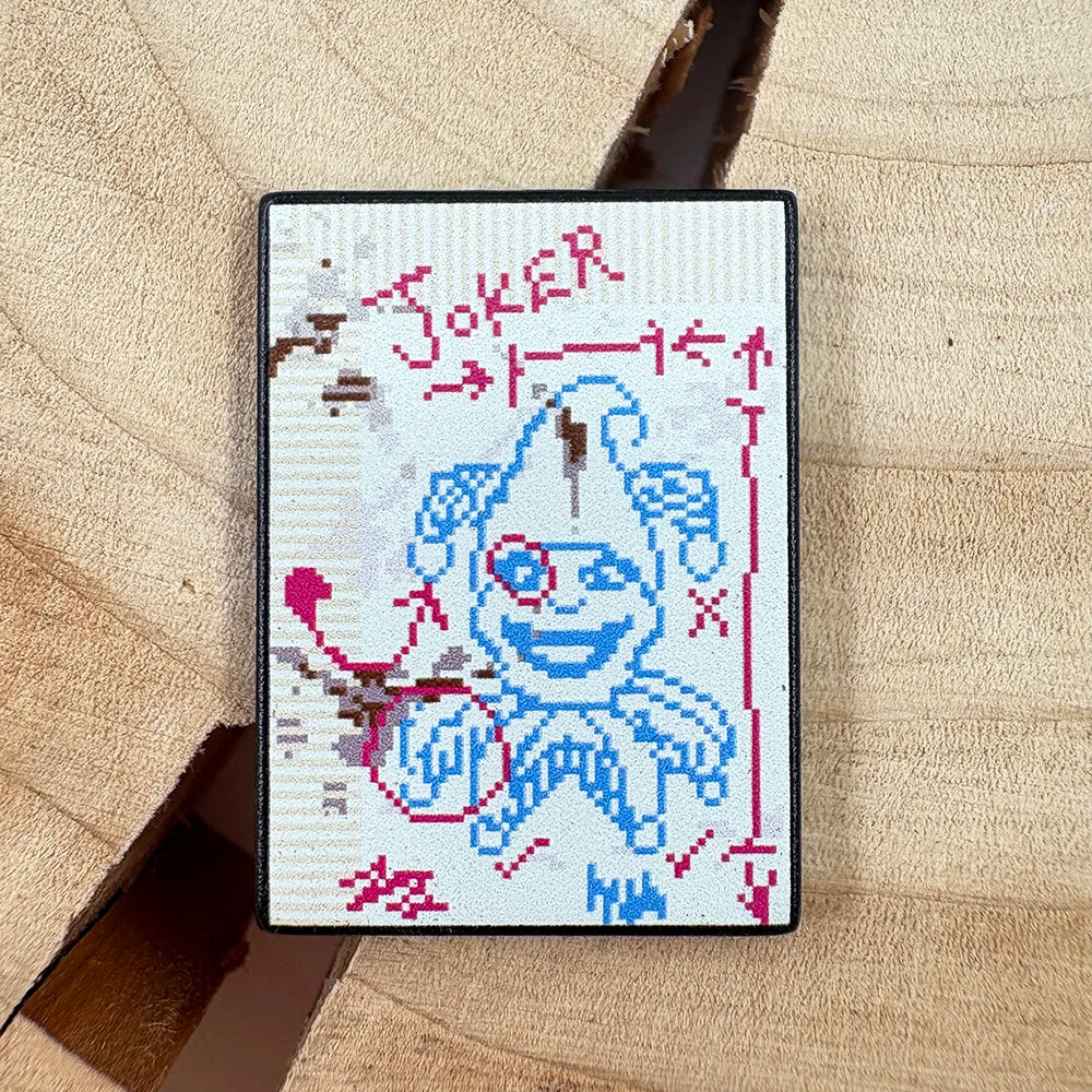 Front view of the Brainstorm Joker Enamel Pin, showing the detailed pixel art from the video game Balatro.