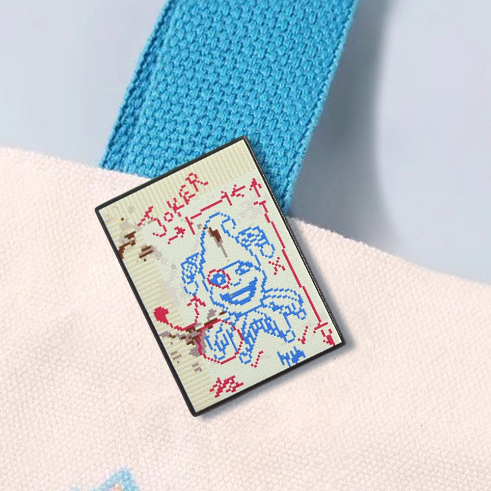 Front view of the Brainstorm Joker Enamel Pin, showing the detailed pixel art from the video game Balatro.