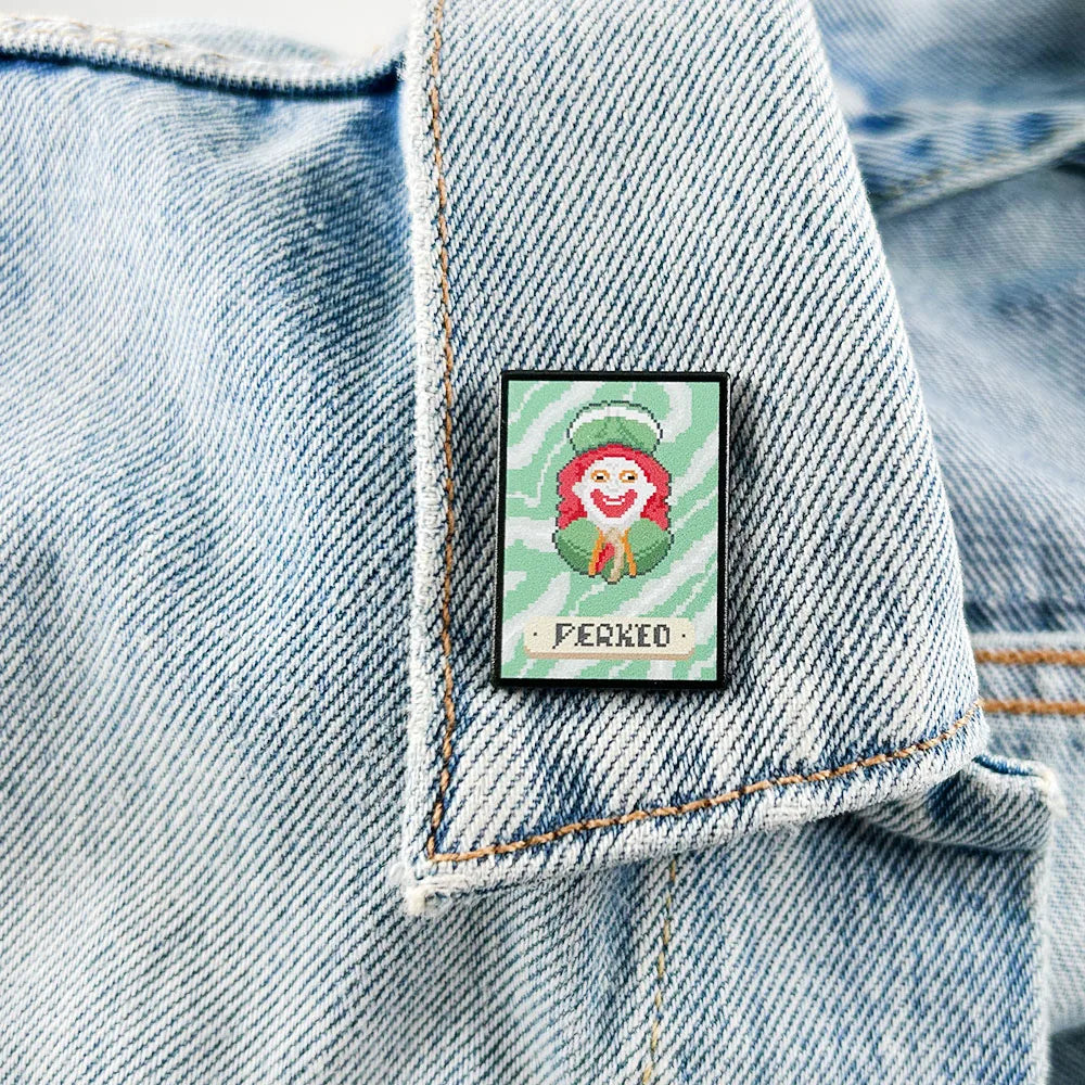 Perkeo Joker Pin on a denim jacket with a character design and 'Perkeo' text.