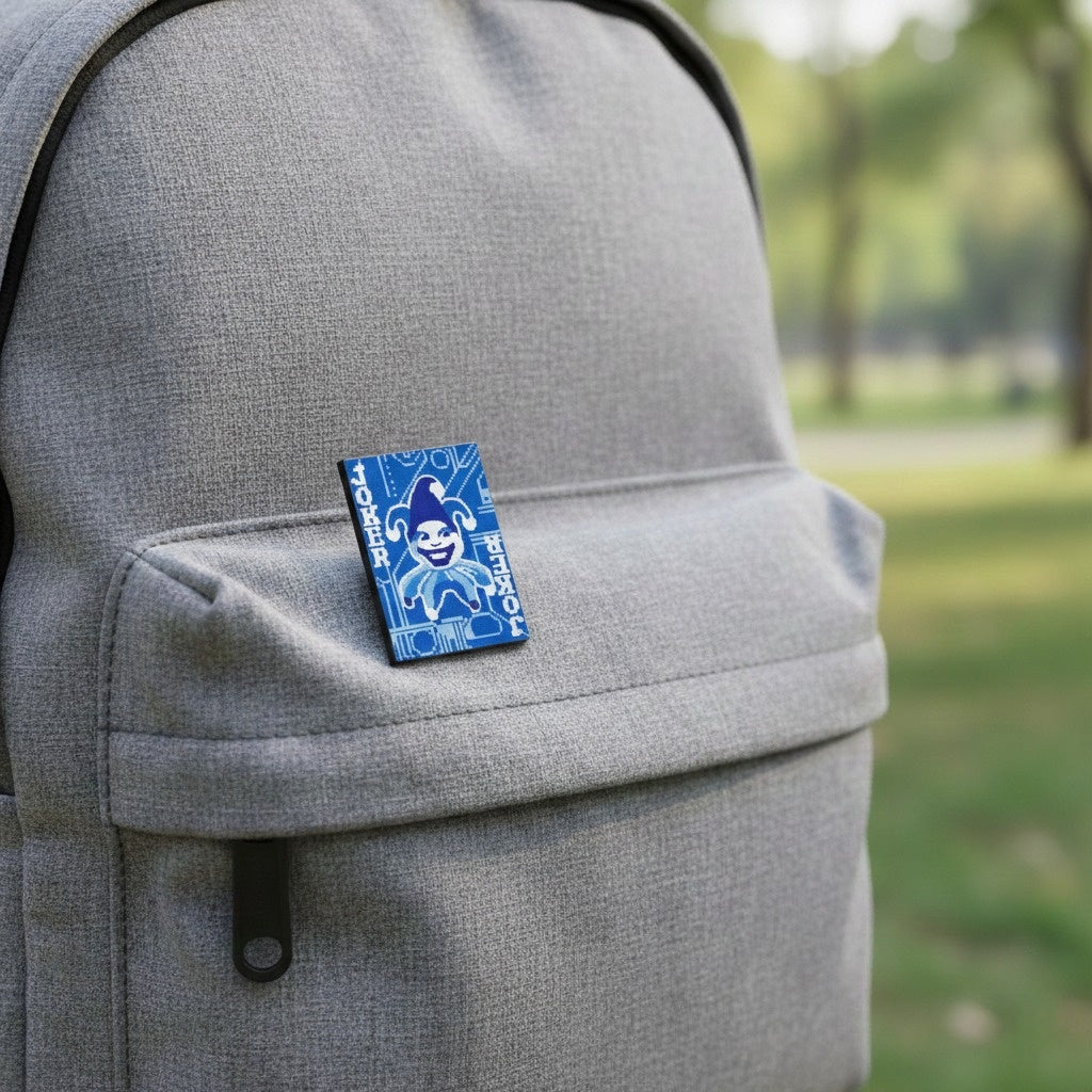 The Blueprint Joker pin attached to a backpack, showcasing it as a stylish accessory for video game fans.