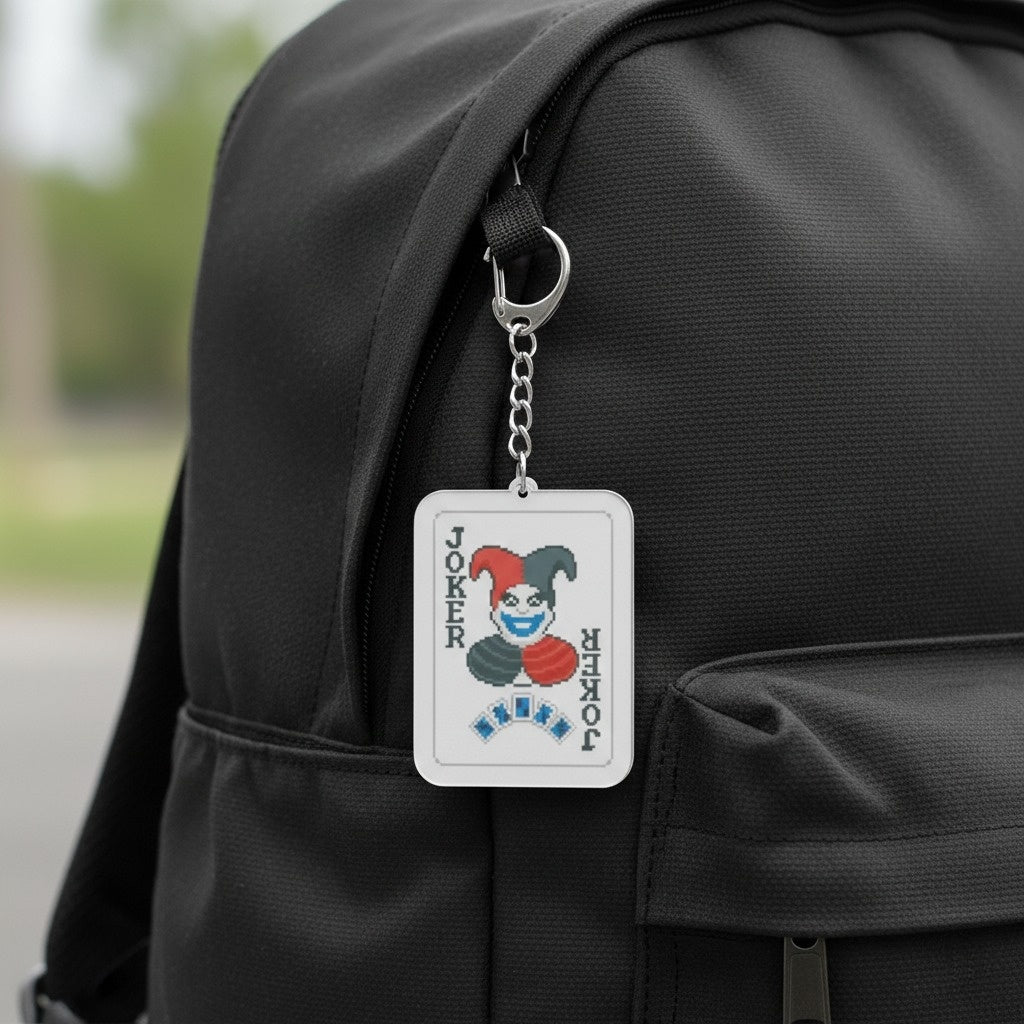 The Classic Joker keychain attached to a backpack, showing the 3.5 inch scale.