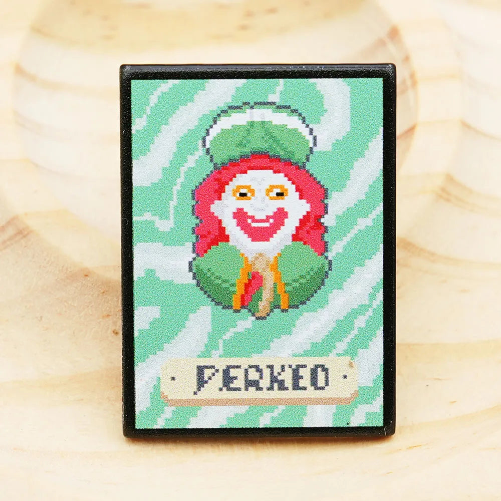 Front view of the Perkeo Joker Enamel Pin, featuring the legendary pixel art design from the Balatro video game.