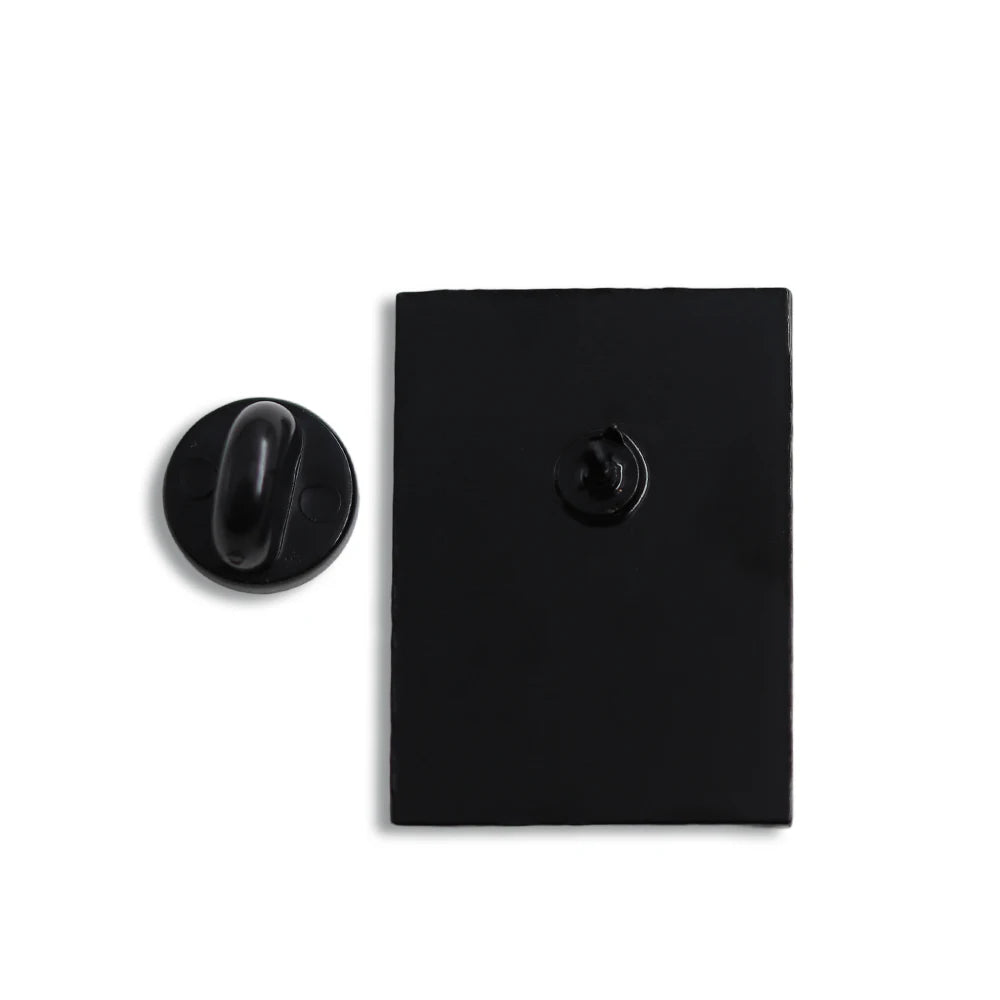 Black square pin with round backing on a white background