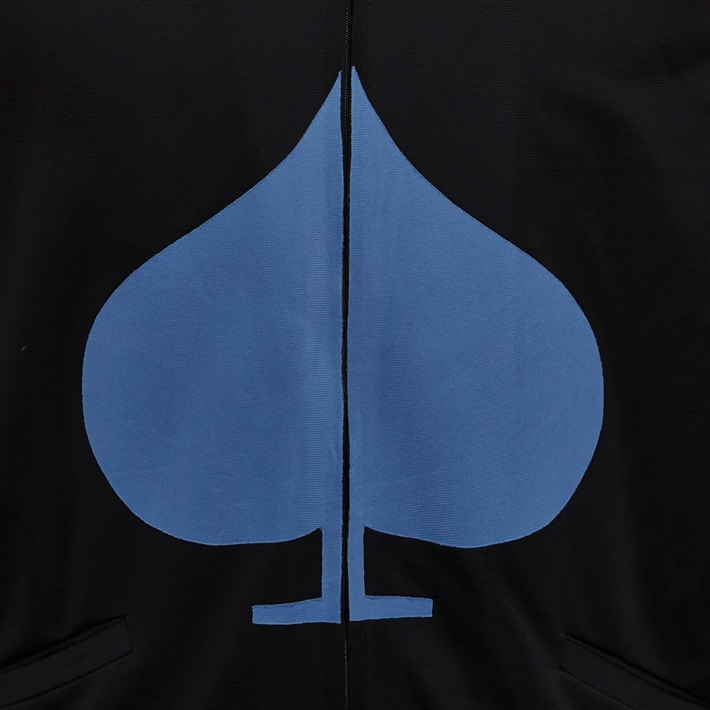 Detail shot of the fabric and stitching on the DELTARUNE Cosplay Lancer jacket.