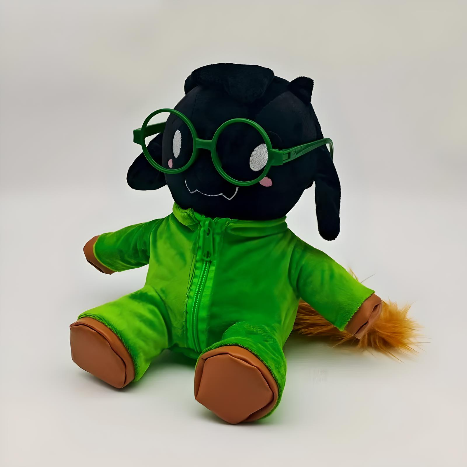 The DELTARUNE Plush Toy No Hat Ralsei displayed on a shelf or gaming desk, perfect for collectors.