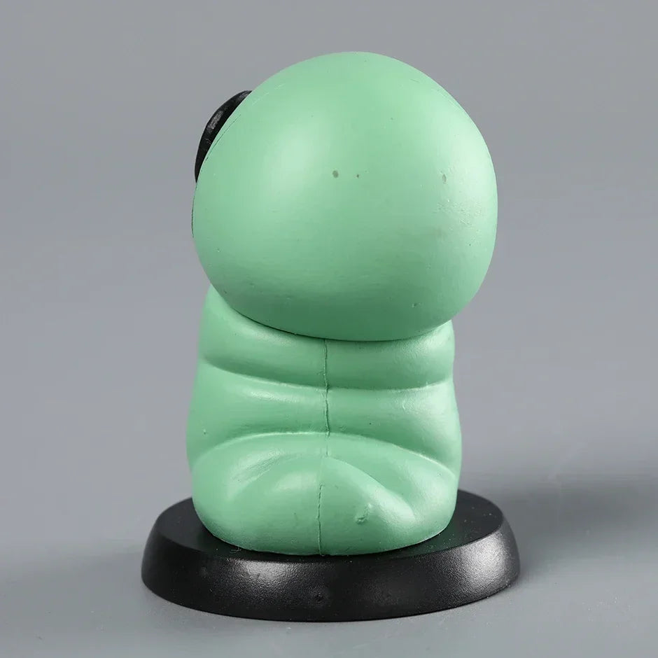 Back view of the adorable Grub Mini Figure, an essential Hollow Knight Merch collectible.