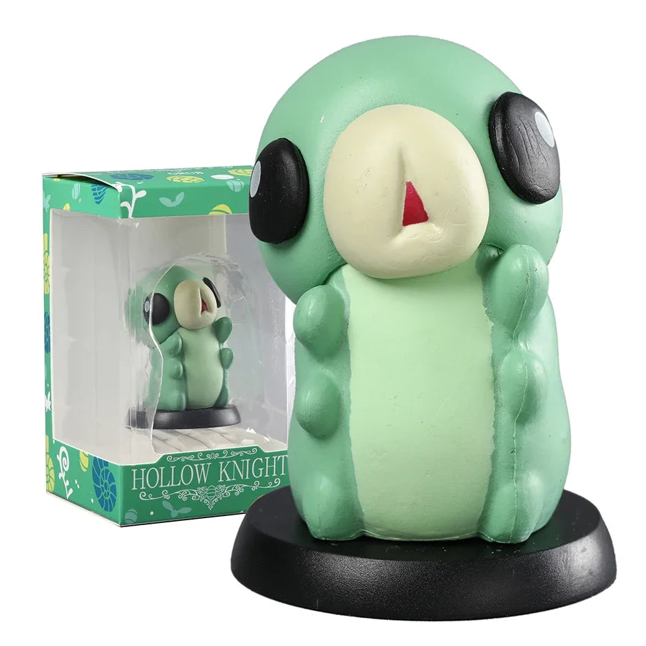Front view of the adorable Grub Mini Figure with box, an essential Hollow Knight Merch collectible.