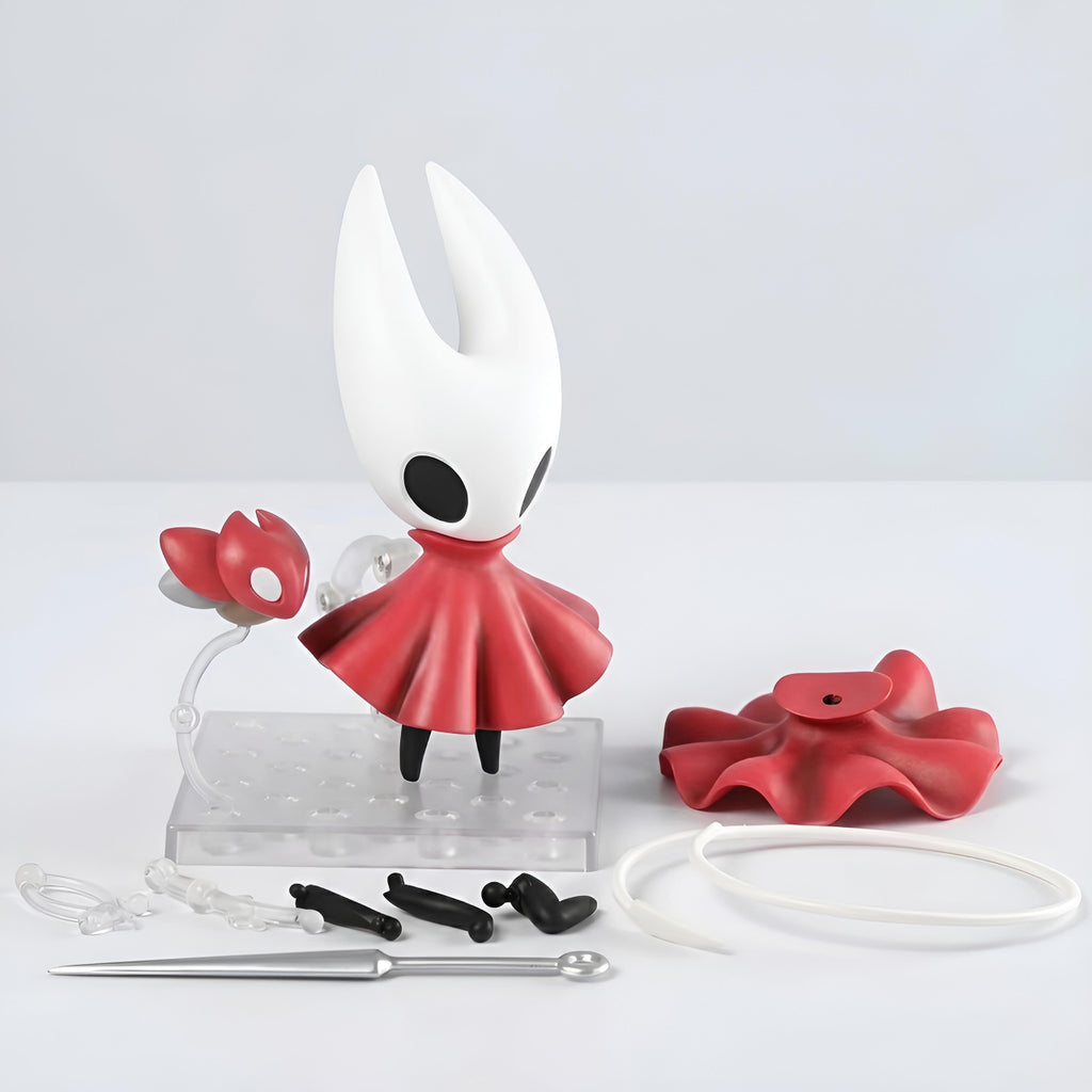 Silksong Hornet figure with tools on a light gray background