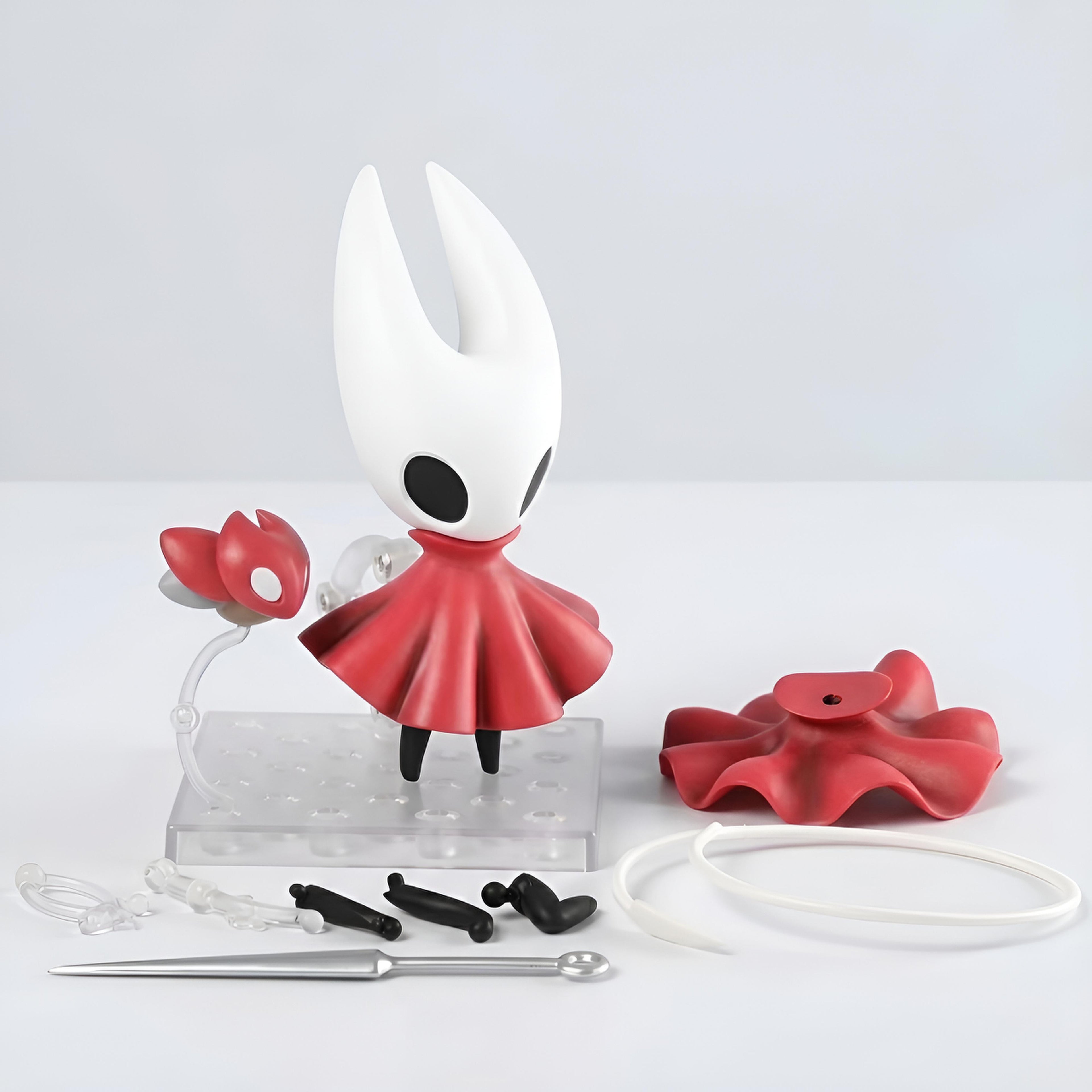 Silksong Hornet figure with tools on a light gray background