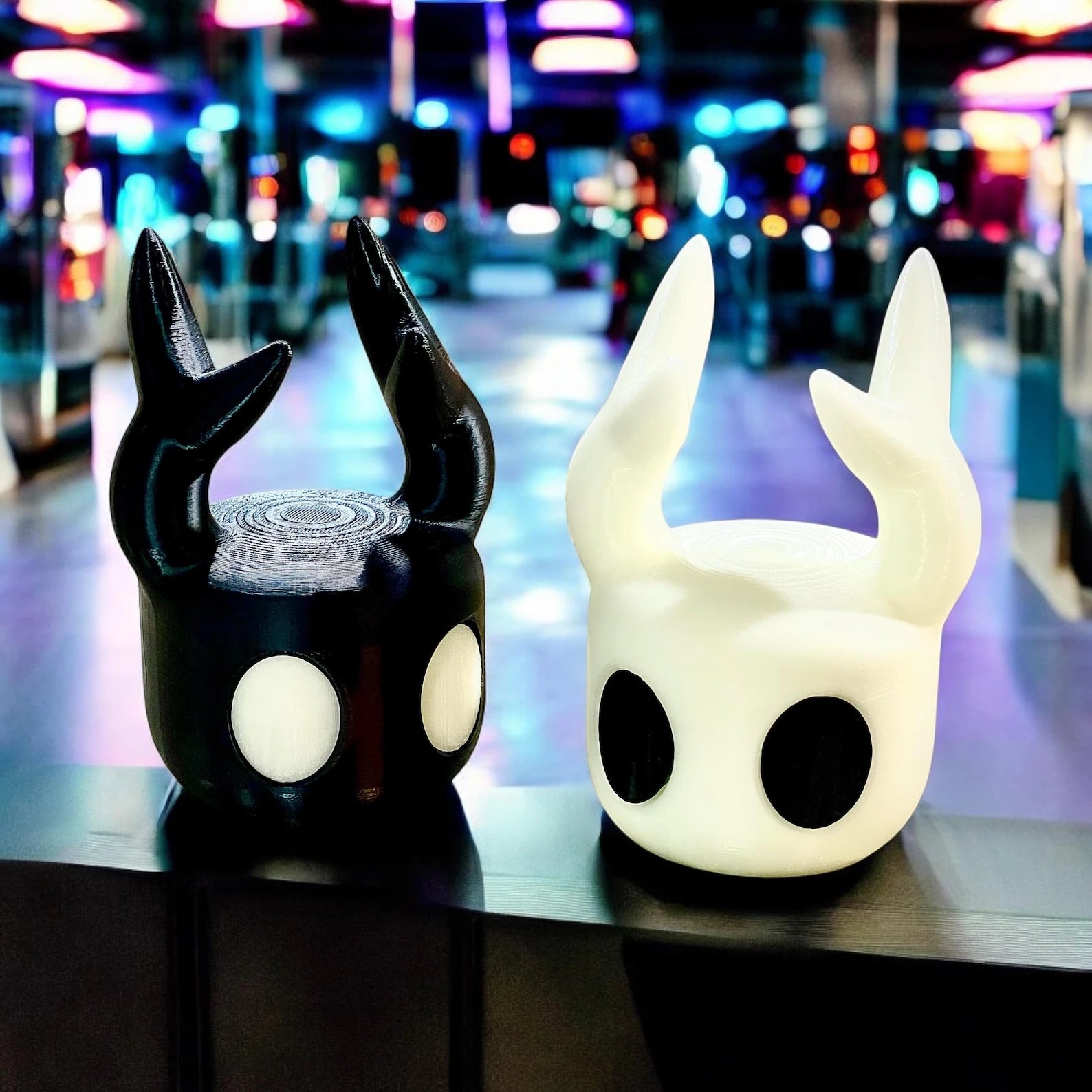 The Hollow Knight Controller Stand holding a game controller, demonstrating its functional use as Hollow Knight Merch.