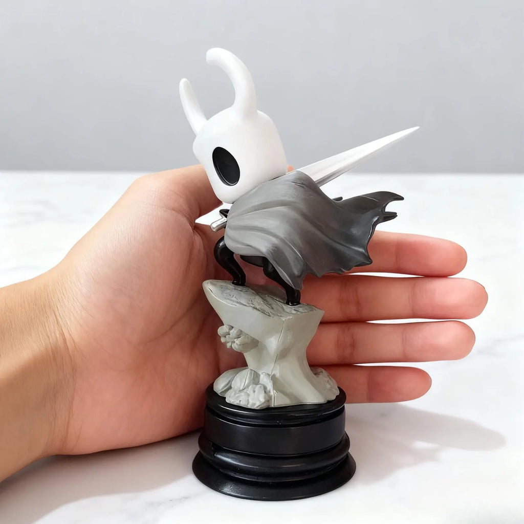 Close-up detail of the Hollow Knight Figure's head and nail, highlighting the quality of the Hollow Knight Merch.
