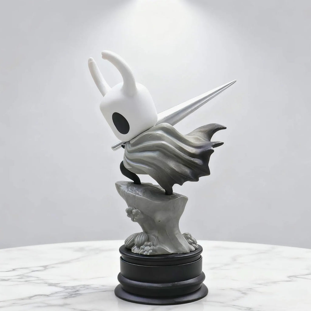 Close-up detail of the Hollow Knight Figure's head and nail, highlighting the quality of the Hollow Knight Merch.
