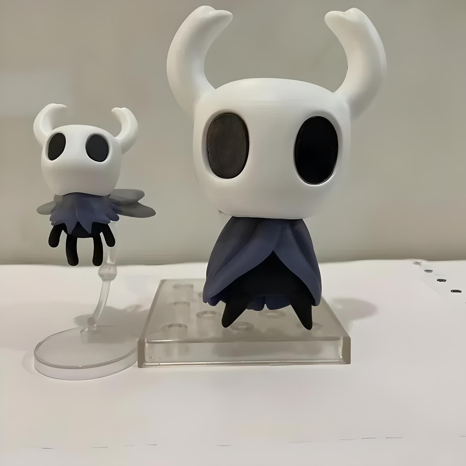 Detailed view of The Knight Hollow Knight Figure in an action pose, perfect for desktop ornaments.