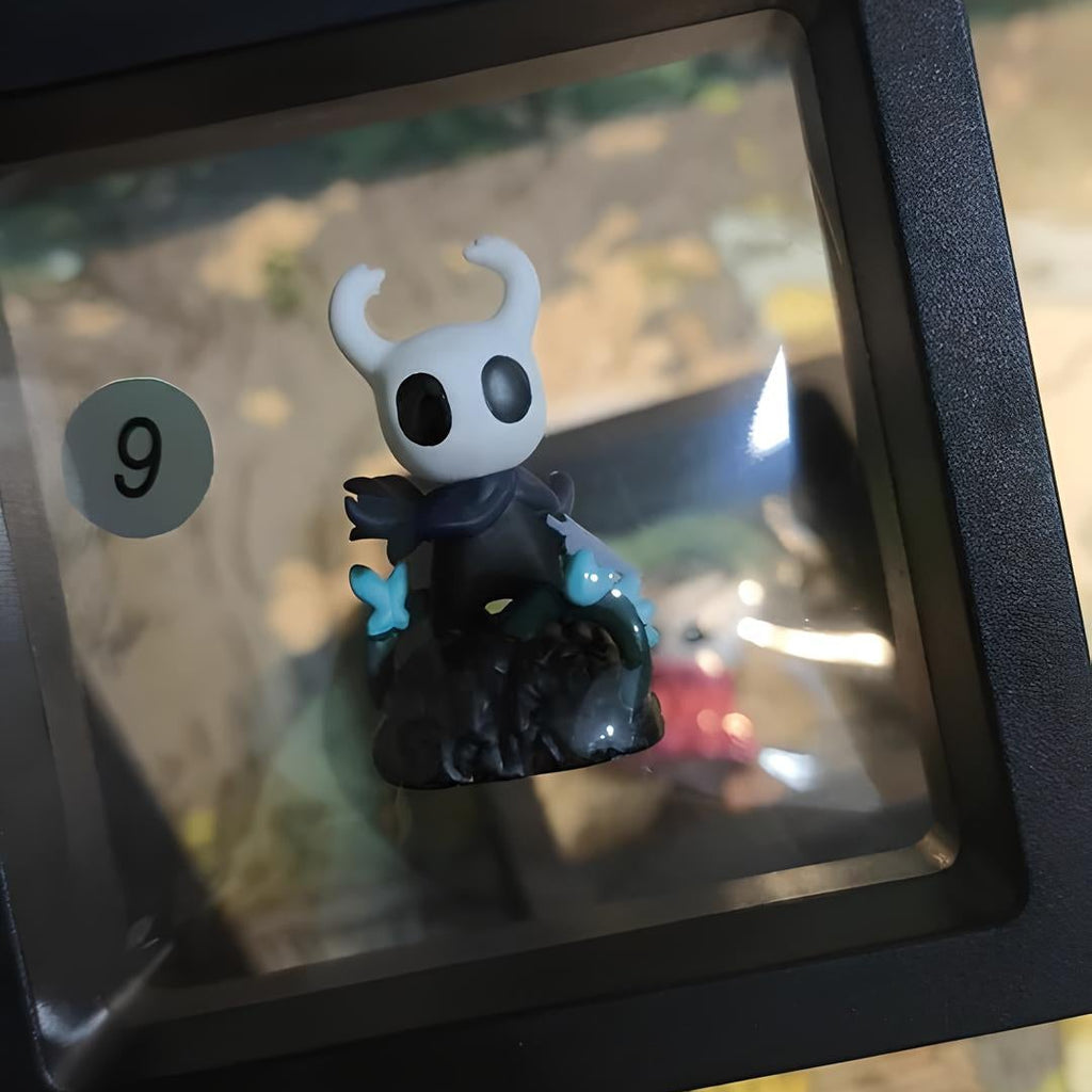 Close-up detail of the artisan Hollow Knight Keycap showing the texture and character sculpt.