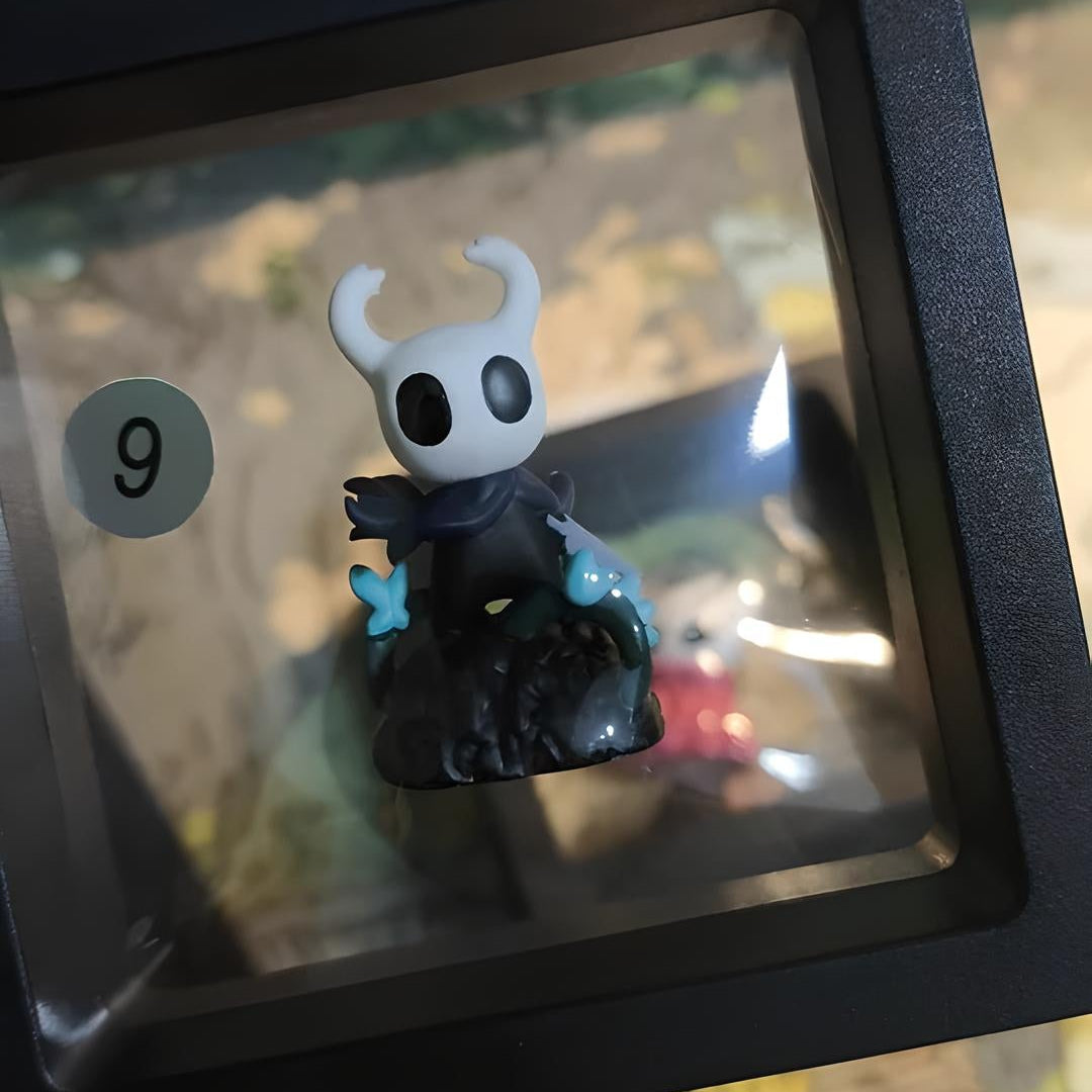 Close-up detail of the artisan Hollow Knight Keycap showing the texture and character sculpt.