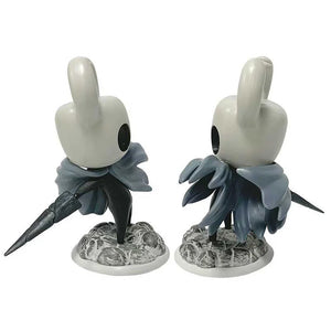 Side view of Hollow Knight Knight figure, showing posture and nail.