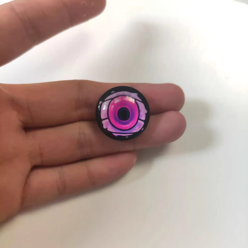 Close-up detail of one of the charms/talismans in the Hollow Knight Magnetic Charm Set (2.5cm/1.0in), highlighting the paint quality.