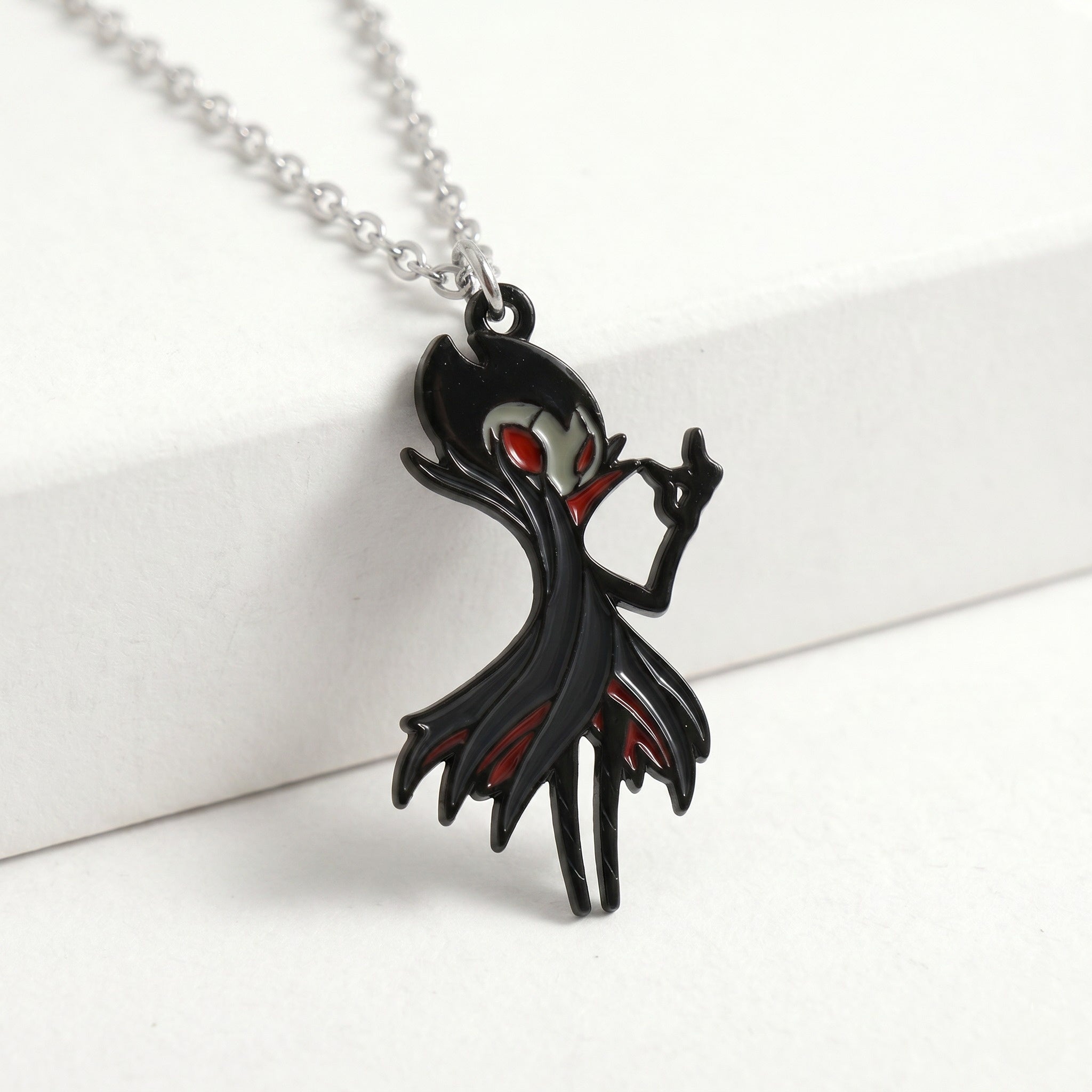 Front view of the Hollow Knight Grimm necklace pendant, premium Hollow Knight Merch.