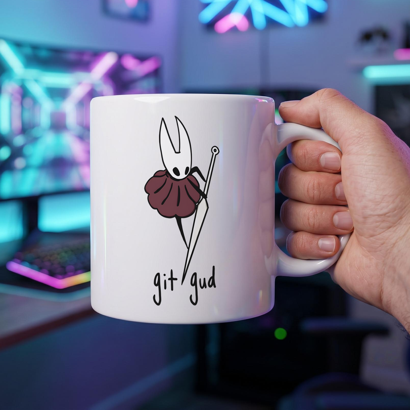 Hand holding the Hornet Hollow Knight mug by the wide, heat-resistant C-handle demonstrating comfortable grip.