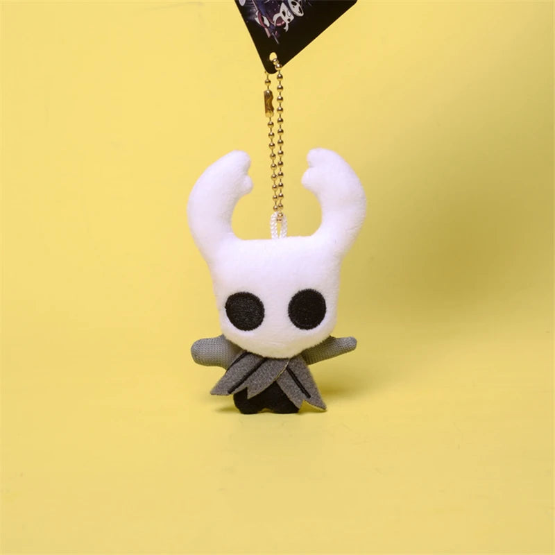 Front view of the Hollow Knight Plush Toy Keychain featuring The Knight, highlighting the soft material and clasp.
