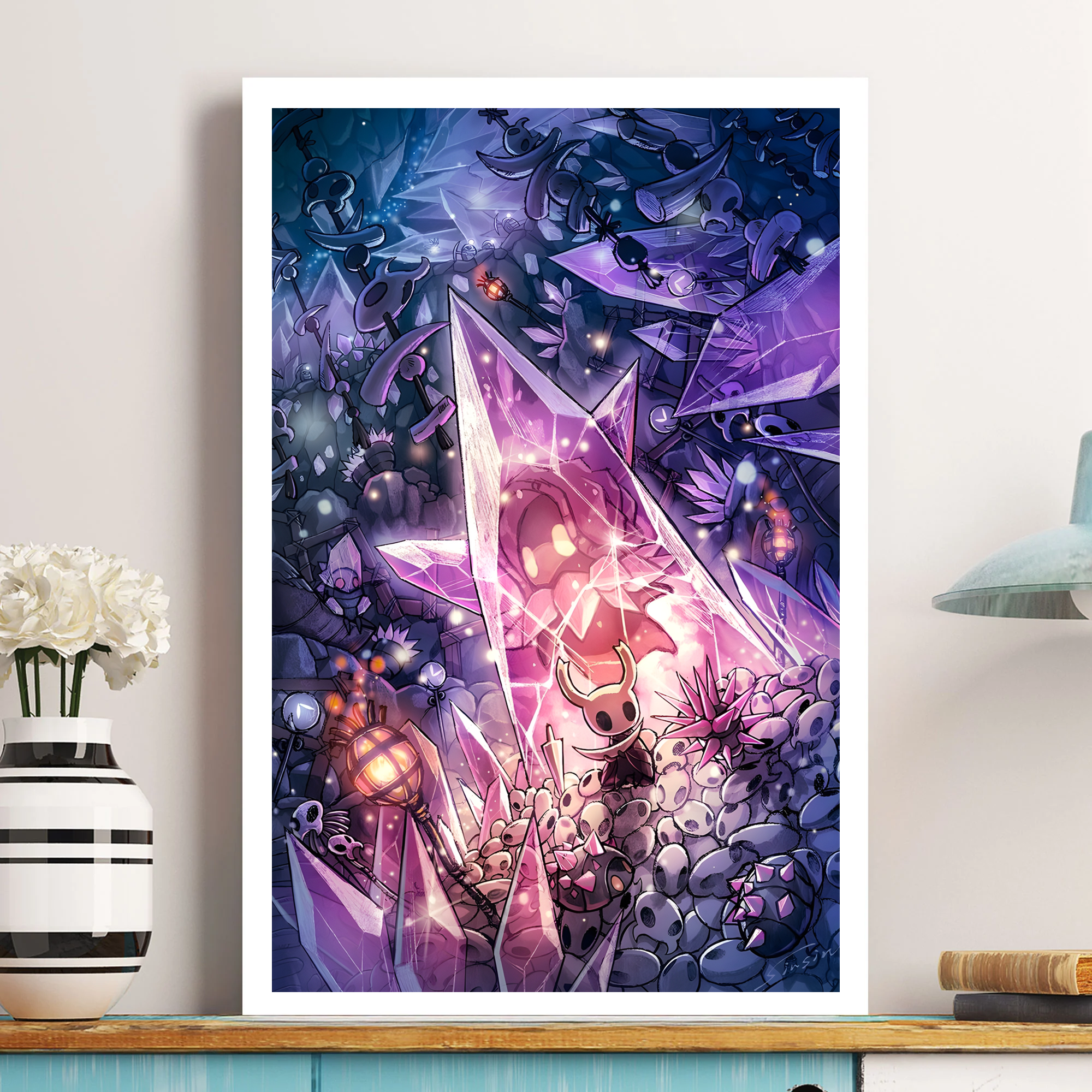 Unframed Hollow Knight Poster print featuring the character ensemble, rolled up and ready for gifting.