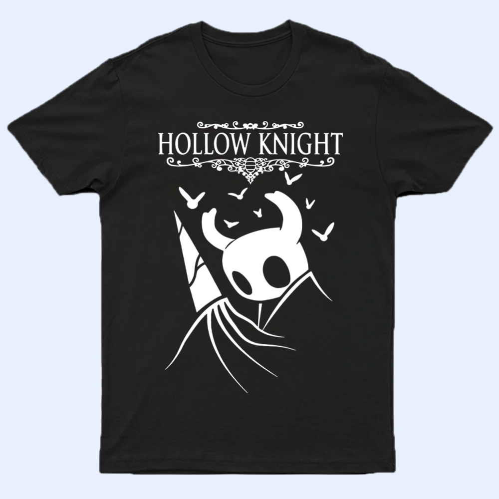 Close-up of a black Hollow Knight shirt featuring a detailed print of The Knight character, laid flat on a white background.