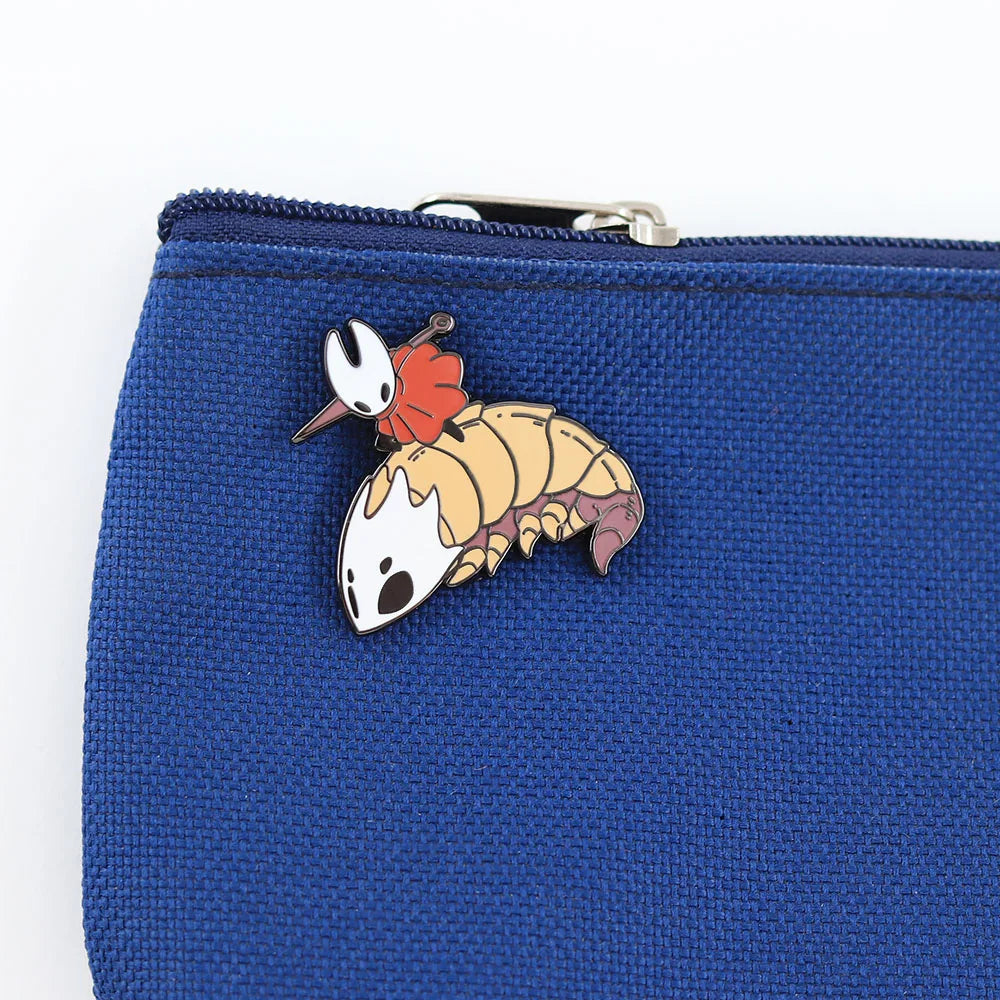 A close-up of the Hornet & Bell Beast enamel pin, set against a plain white background.