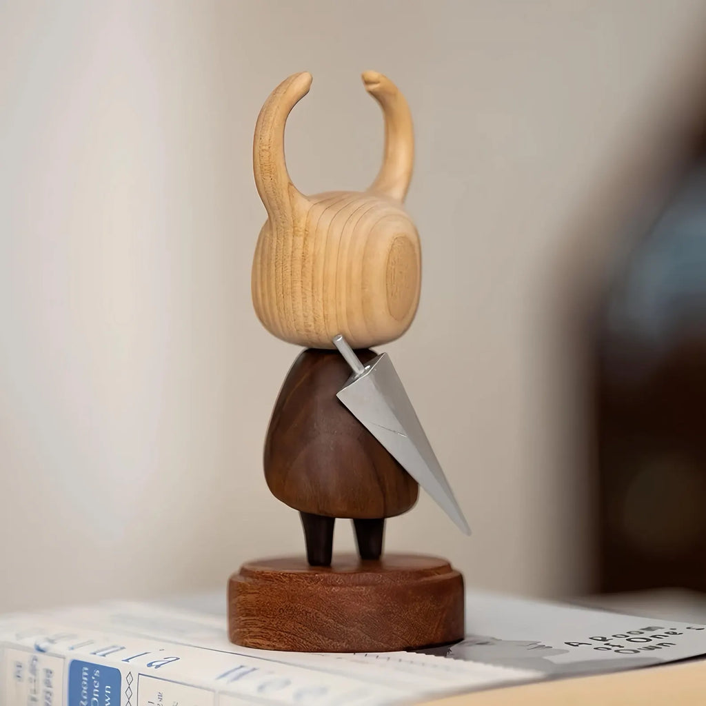 Back view of The Knight Hollow Knight Wooden Figure, showcasing the natural wood grain and carved details.