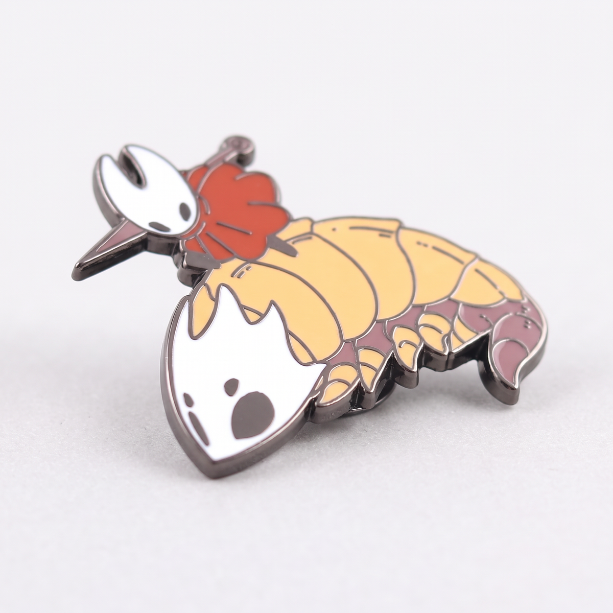 Details of the Hornet & Bell Beast enamel pin showing the metal material