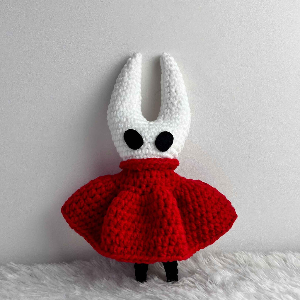 Size reference image of the Hornet Crochet Doll (17cm/6.7in), showing its perfect size for display on a shelf.